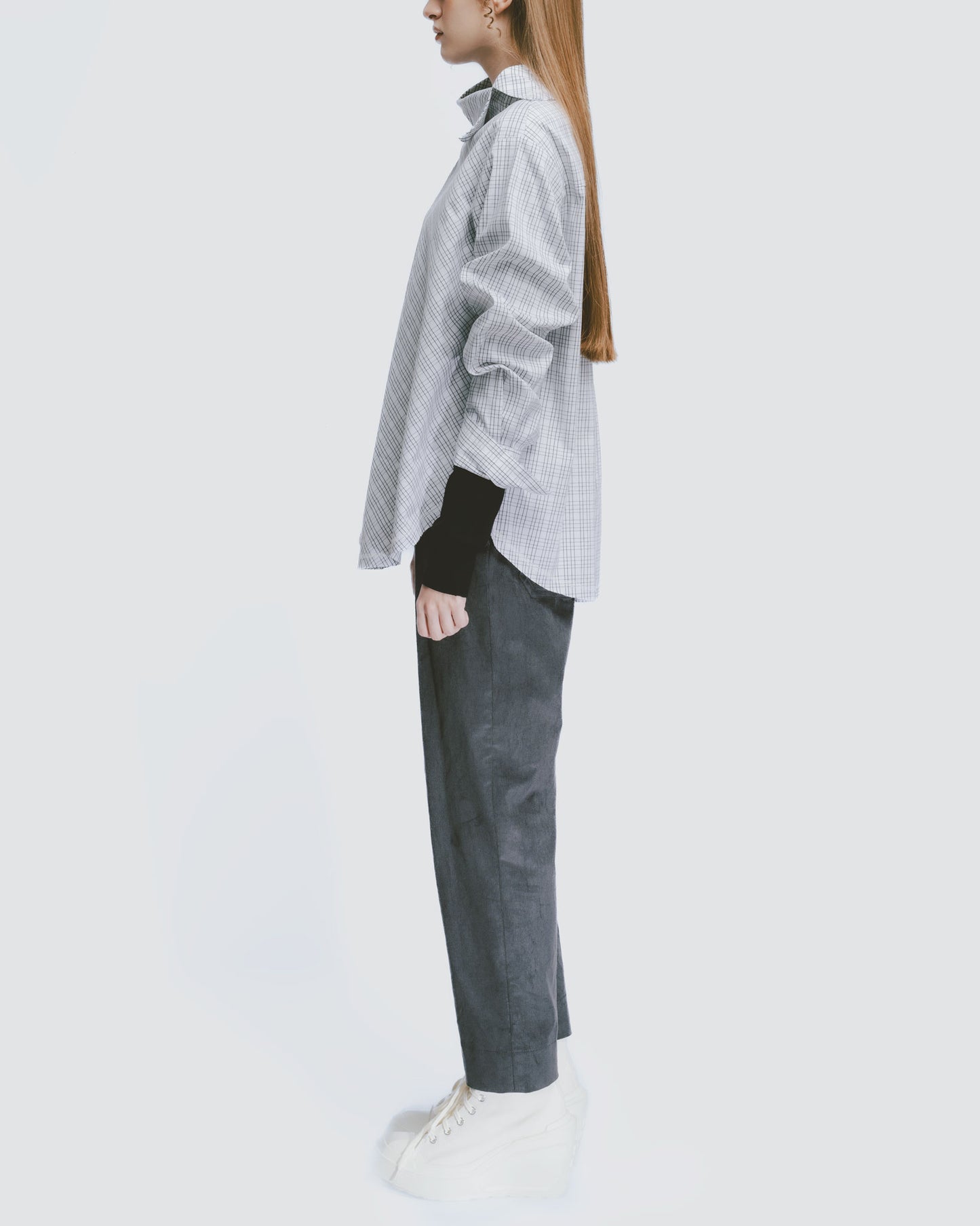 Black and white plaid funnel neck top