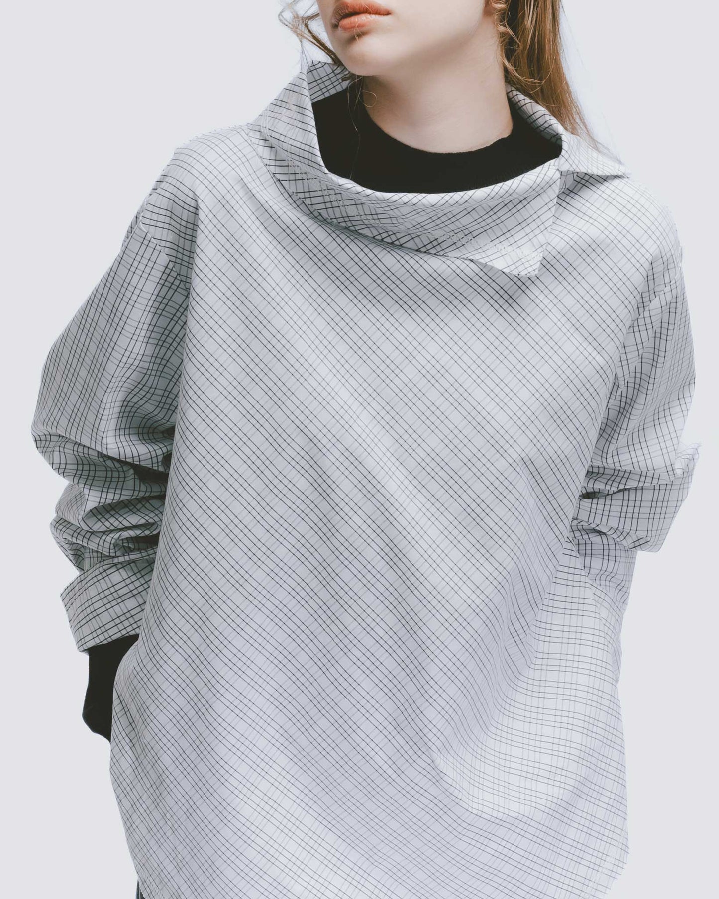 Black and white plaid funnel neck top