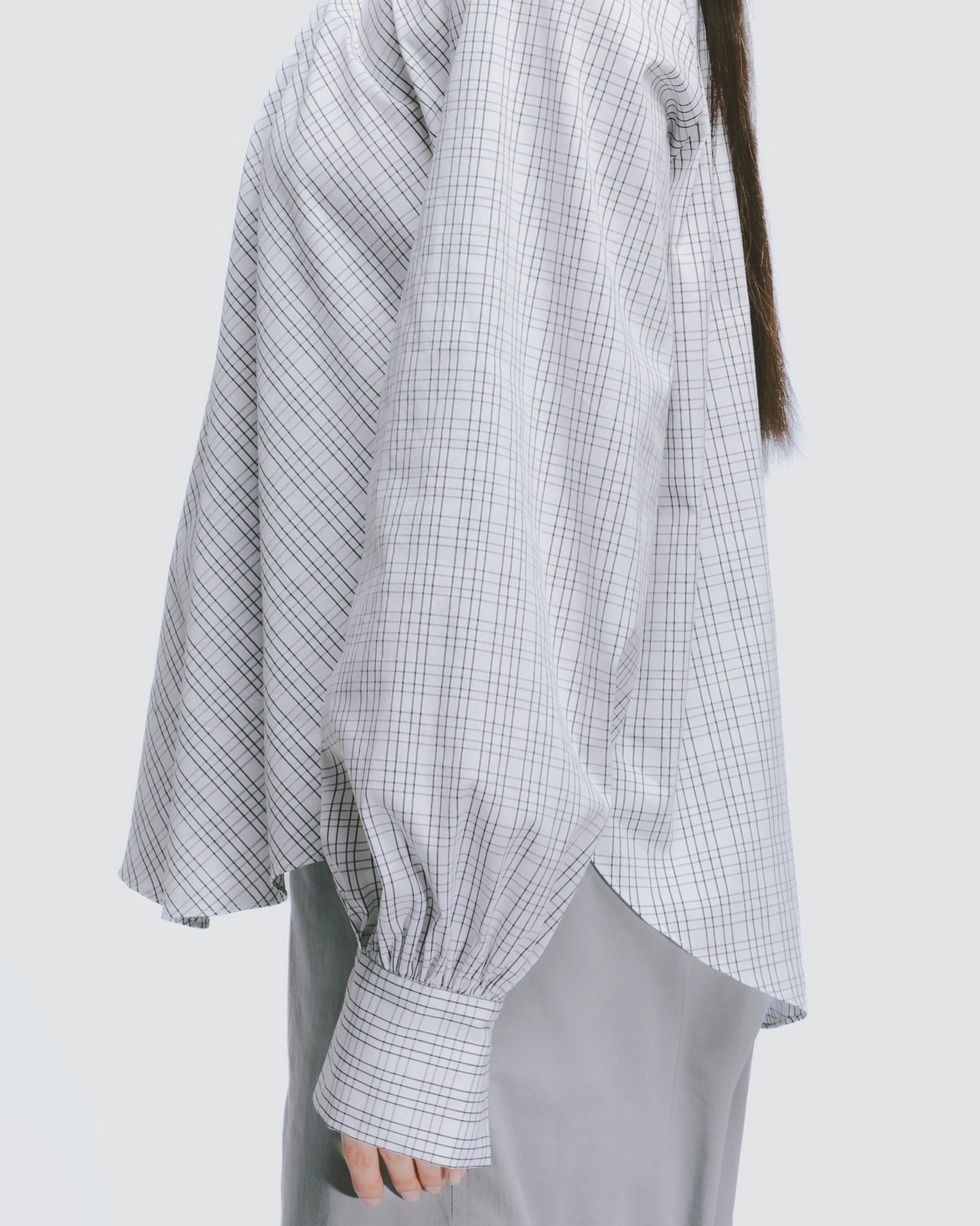 Black and white plaid court sleeve high collar pleated top