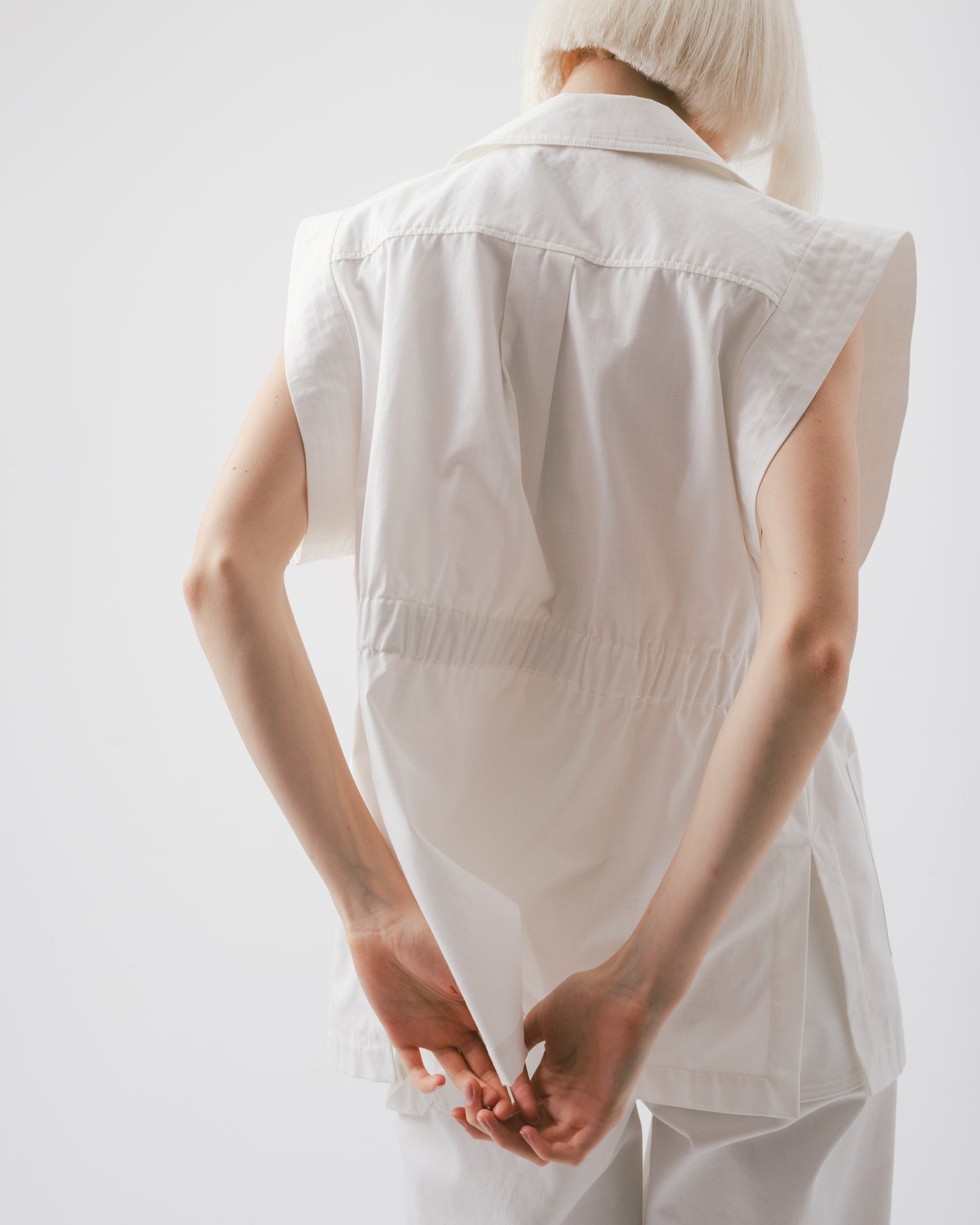 Side waist elastic vest