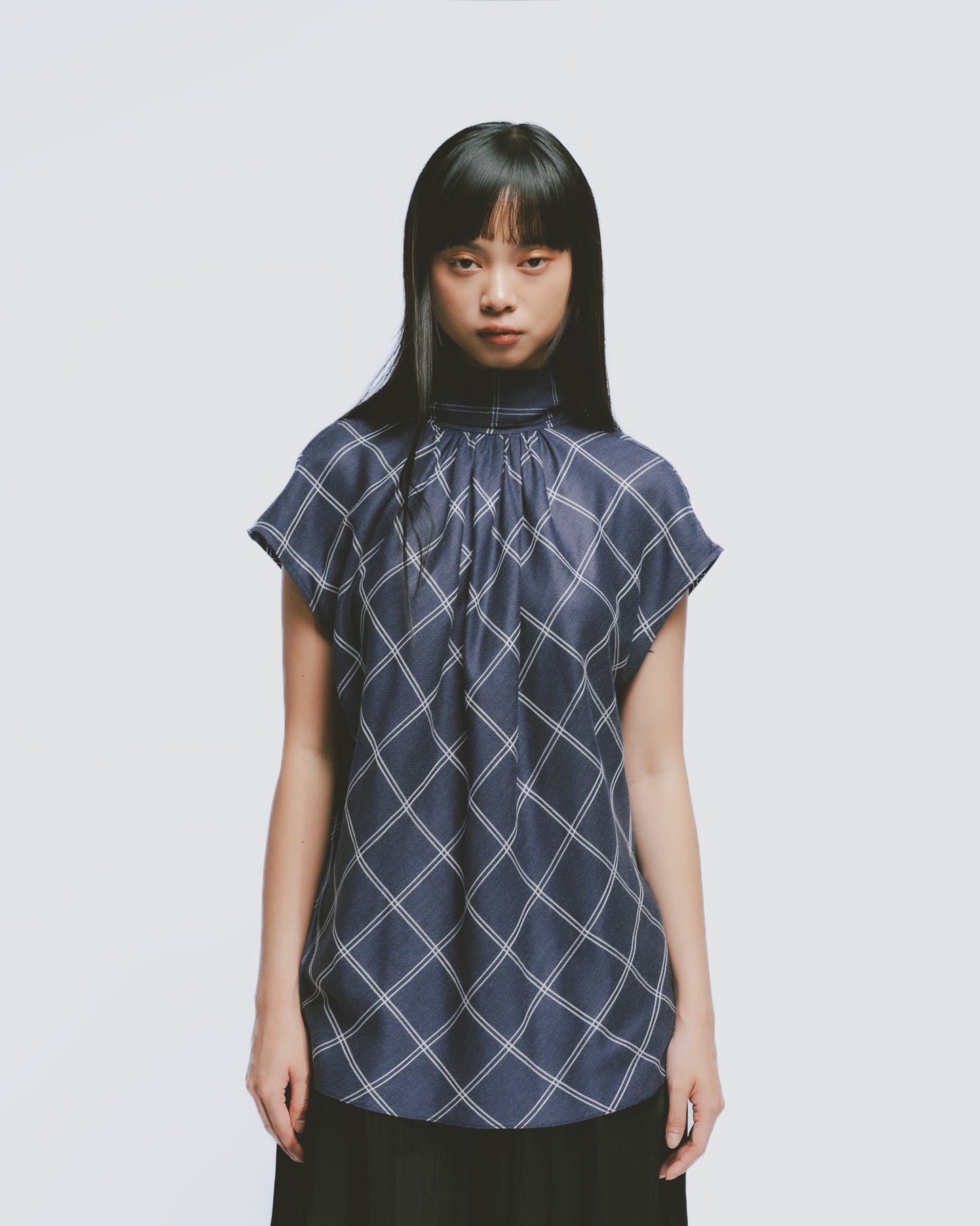 Blue and white plaid high collar pleated top