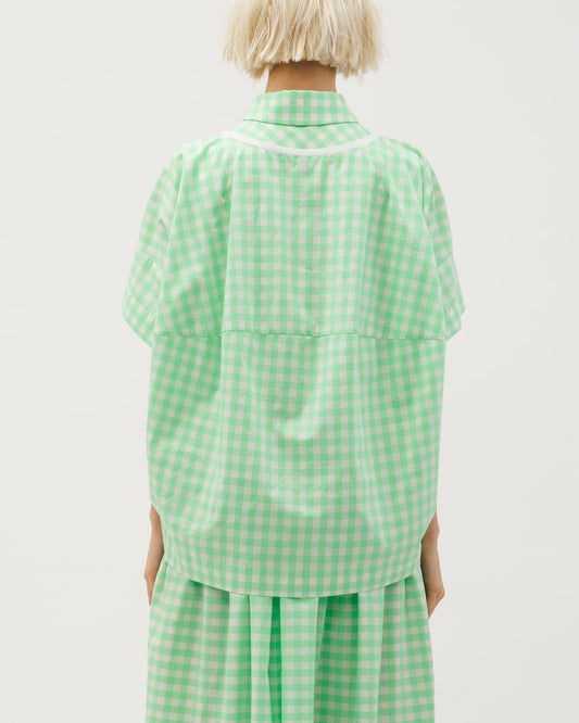 Green and white checkered three-dimensional cutting top