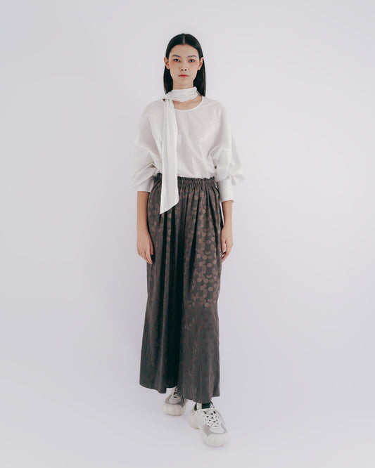 Wide-sleeved lace-up top with shimmering sleeves