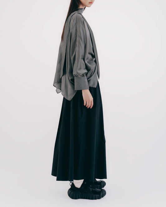 Textured black curved pleated skirt