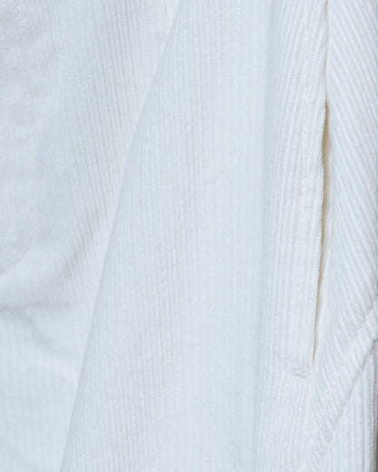 純白燈芯絨弧線剪接寬褲