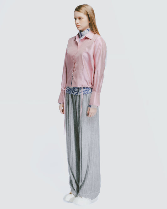 Off-white textured elastic draped trousers 